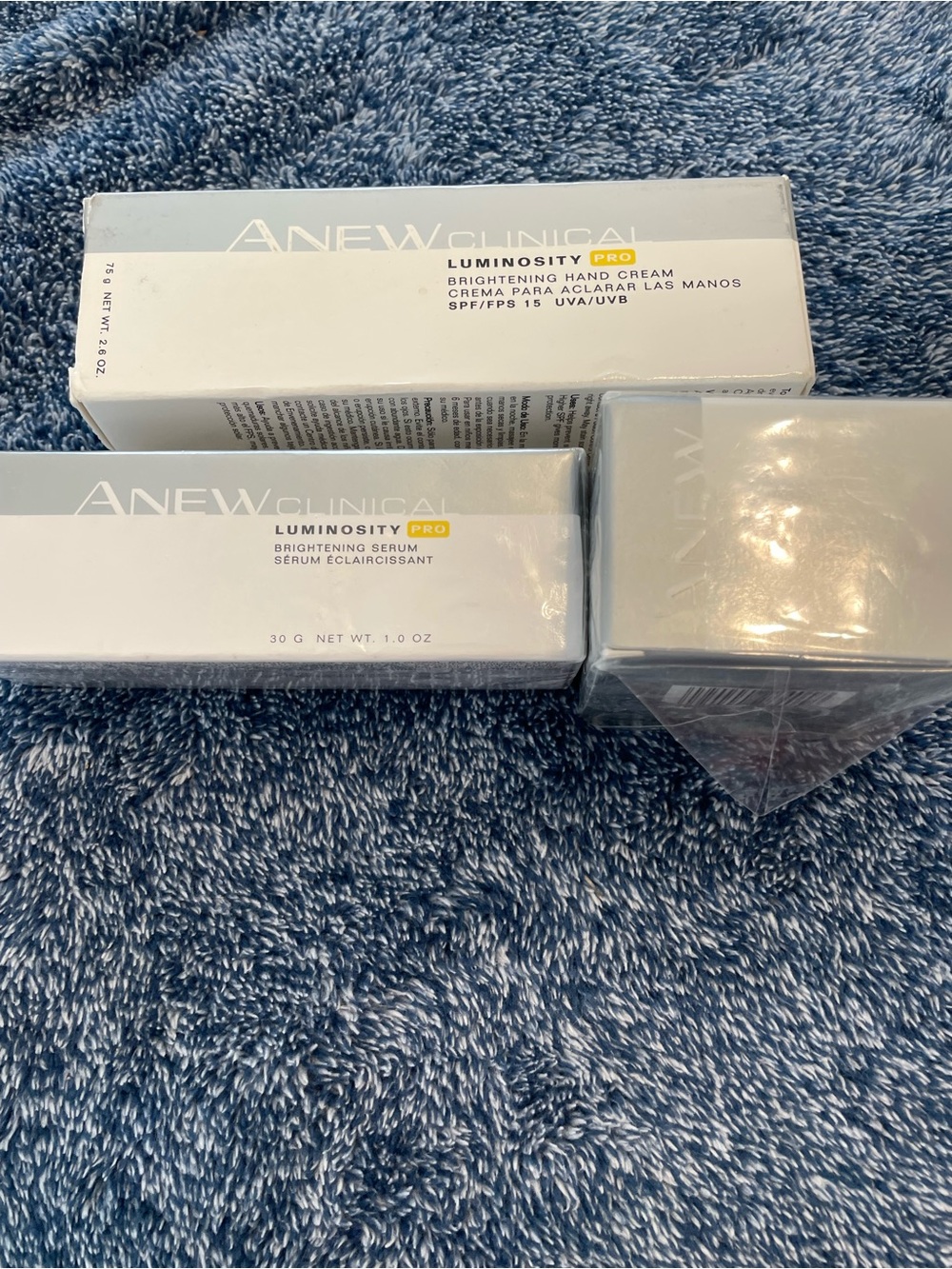Luminosity Pro Brightening Serum & Hand Cream - White. Set of three